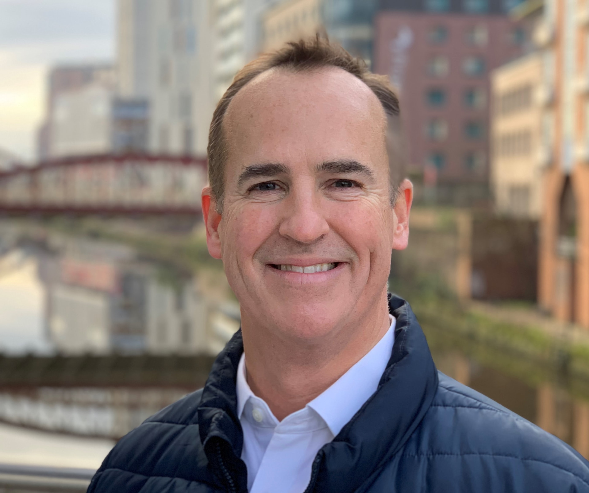 Brian Westley, ICF-accredited leadership and executive coach, photographed by the canal in Manchester
